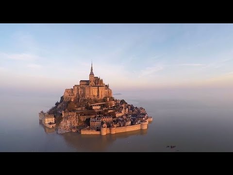 découvrez une vidéo innovante utilisant l'ia pour revisiter le mont saint-michel et soulever des questions inédites sur son histoire et sa représentation.